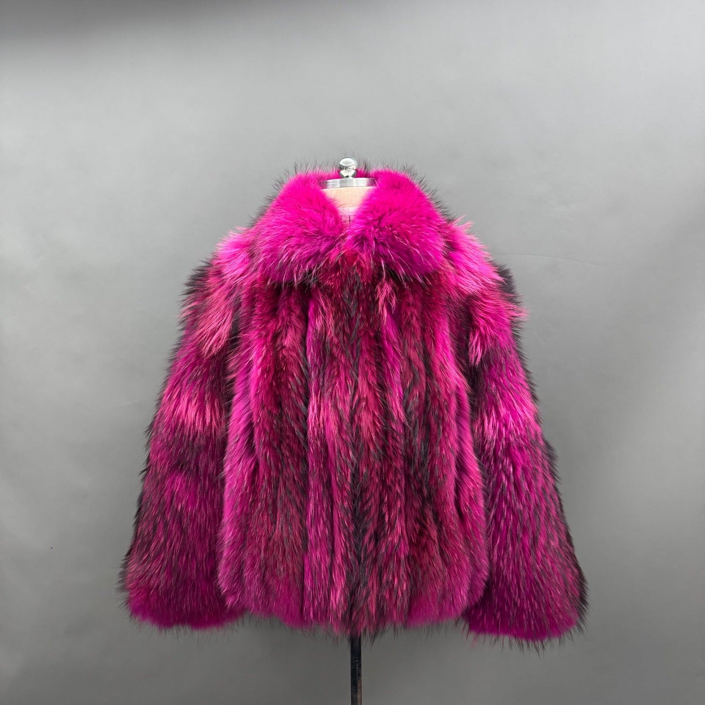 Hot pink fox fur statement jacket on display