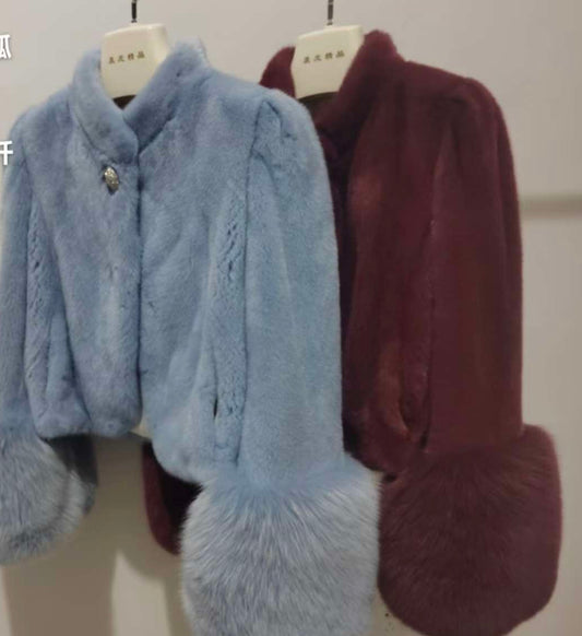 Powder blue and burgundy mink jackets with oversized fur cuffs
